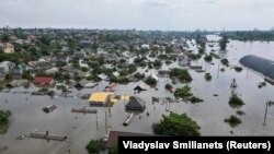 Затопление после прорыва плотины на Каховской ГЭС.