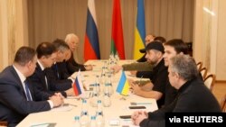 Russian and Ukrainian officials take part in the talks in the Gomel region, Belarus Feb. 28, 2022. 