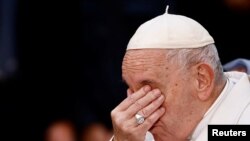 Pope Francis cries while speaking about Ukraine as he attends the Immaculate Conception celebration prayer in Piazza di Spagna in Rome, Italy, Dec. 8, 2022. 