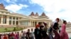 Myanmar's youth dressed in different ethnic minorities' attires walk to Myanmar's parliament to attend a function to mark the International Day of Democracy in Naypyidaw, Myanmar, Tuesday, Sept. 15, 2015. More than 90 political parties will take part in the parliamentary election