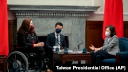 U.S. Sen. Tammy Duckworth, D-Ill., left, meets with Taiwan's President Tsai Ing-wen at the Presidential Office in Taipei, May 31, 2022.