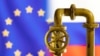 A model of the natural gas pipeline is seen in front of displayed word EU and Russia flag colours in this illustration taken March 8, 2022. 