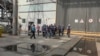 In this handout photo taken from video released by Russian Defense Ministry Press Service Sept. 2, 2022, members of International Atomic Energy Agency (IAEA) walk while inspecting the Zaporizhzhia Nuclear Power Plant in Enerhodar, southeastern Ukraine, Se