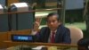 This screengrab of handout video made available on the U.N. YouTube channel shows Myanmar's ambassador Kyaw Moe Tun making a three-finger salute as he addresses the General Assembly on Feb. 26, 2021 in New York.