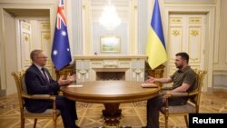 Ukrainian President Zelenskiy attends a joint news briefing with Australian Prime Minister Albanese in Kyiv