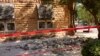 Stonework litters the sidewalk outside an empty jewelry store at the corner of Sixth and Harrison in Pawnee, Oklahoma, after a 5.6 magnitude earthquake struck near the north-central Oklahoma town, Sept. 3, 2016.