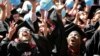 Students celebrate after graduating from Harvard University on May 28, 2015, in Cambridge, Massachusetts. 