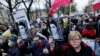 Protesters gather outside Poland's Constitutional Tribunal in Warsaw, Nov. 6, 2021, rallying against restrictive abortion laws after a woman died of complications during her pregnancy. 