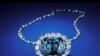 In this photo from the Smithsonian Institution,The Hope Diamond is seen in Washington. The famed diamond glows a mysterious red when exposed to ultraviolet light, a finding that scientists say can help them "fingerprint" diamonds and tell the real ones fr