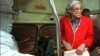 Rosa Parks visits an exhibit illustrating her bus ride of December, 1955 at the National Civil Rights Museum in Memphis, Tennessee, July 15, 1995. 