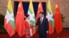 Myanmar State Counsellor Aung San Suu Kyi (L) shakes hands with Chinese President Xi (MOI)