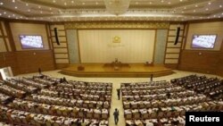 Members of parliament attend the opening of the Lower House session in Naypyitaw.