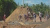 Construction workers building a condominium at the site of the Chinese resort town on the outskirts of Shwe Koko in Karen state, Myanmar.