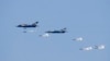 FILE - Myanmar Air Force Jet fighters drop bombs during military exercises Friday, Feb. 2, 2018, in Ayeyarwaddy delta region, Myanmar. (Lynn Bo Bo/Pool via AP, File)