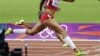  Allyson Felix crosses the finish line to win gold.