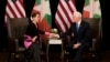 US Vice President Mike Pence (R) shakes hands with Myanmar State Counsellor Aung San Suu Kyi during a bilateral meeting on the sidelines of the 33rd Association of Southeast Asian Nations (ASEAN) summit in Singapore on November 14, 2018. (Photo by Bernat Armangue / POOL / AFP)