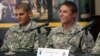 U.S. Army Army 1st Lt. Shaye Haver, right, speaks with reporters, Thursday, Aug. 20, 2015.